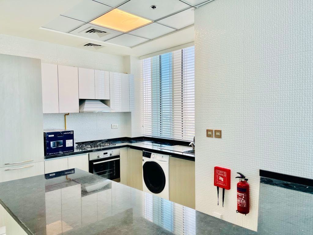 Bright & Elegant 2BR | High Floor | Prime Community Living